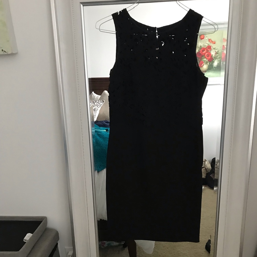 H&M fitted black dress with lace detail on top.